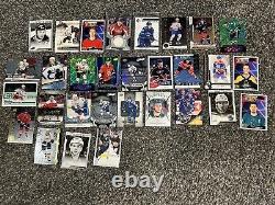 1300+ Hockey Cards, 4 Jumbos, and Tiger Woods with Protection Cases